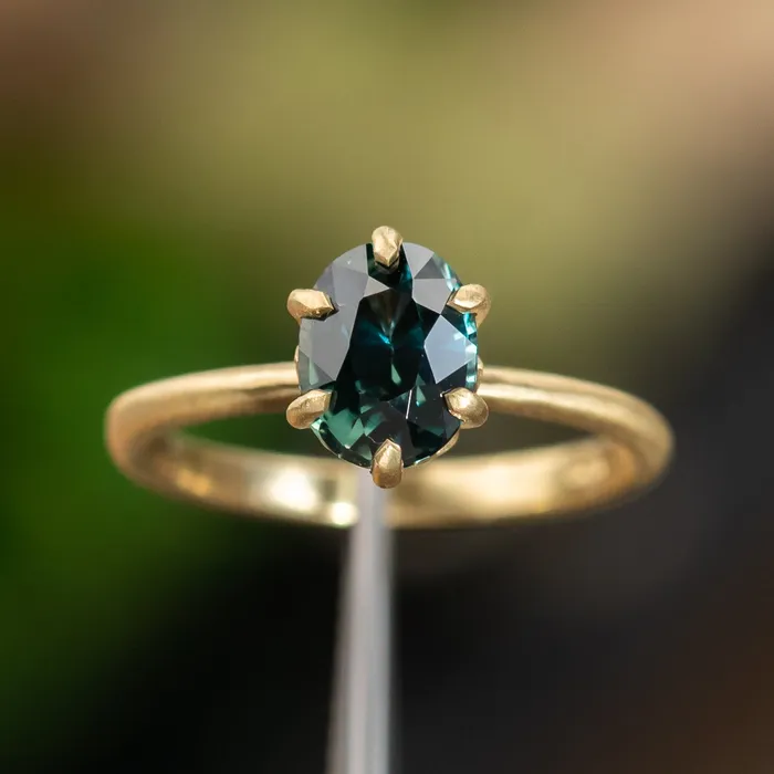 Anueva Jewelry PreStyled Sets 177ct Teal Oval Madagascar Sapphire Lotus Six Prong Solitaire in Satin 18k Yellow Gold